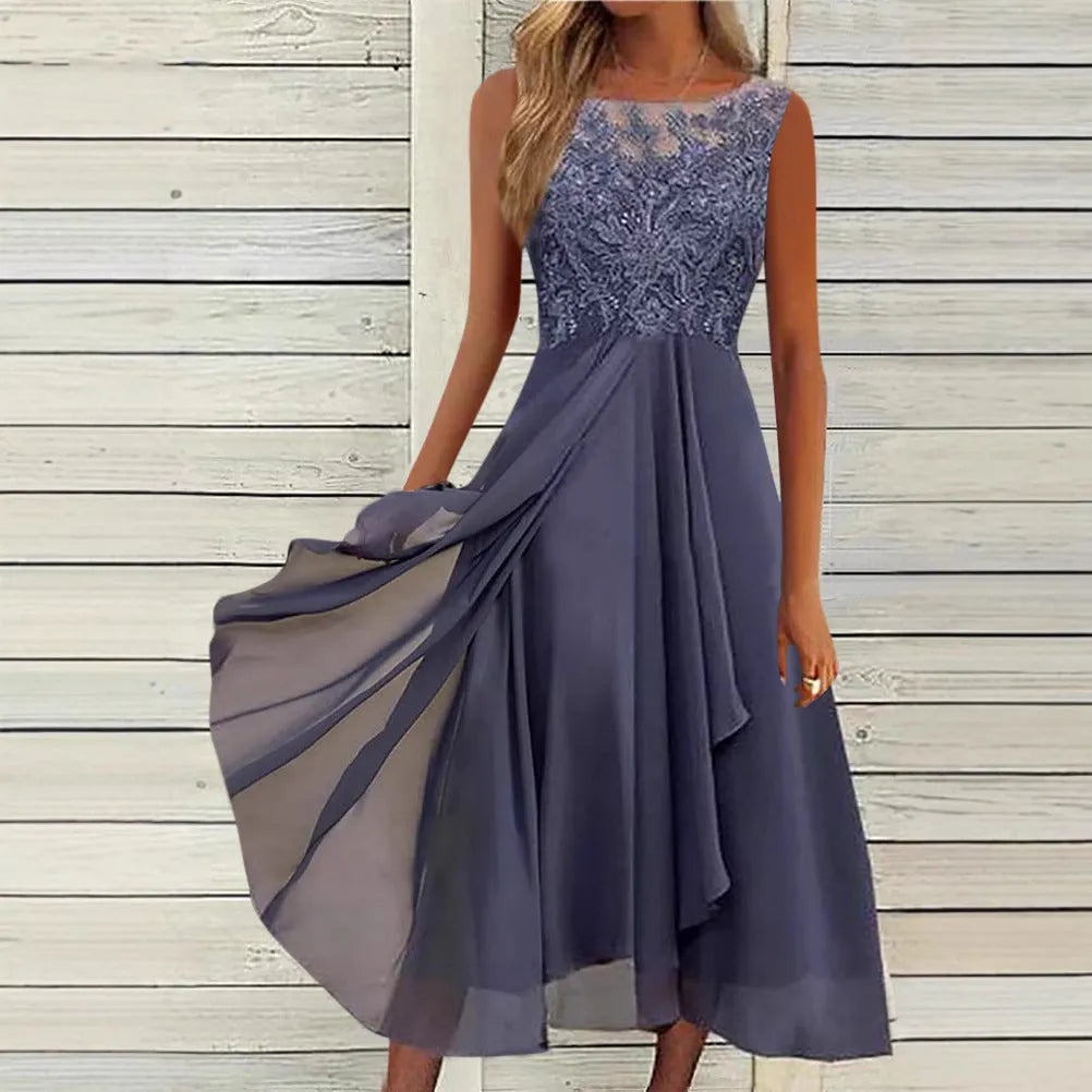 Women's sleeveless green chiffon dress with lace hollow-out stitching detail, midi length.