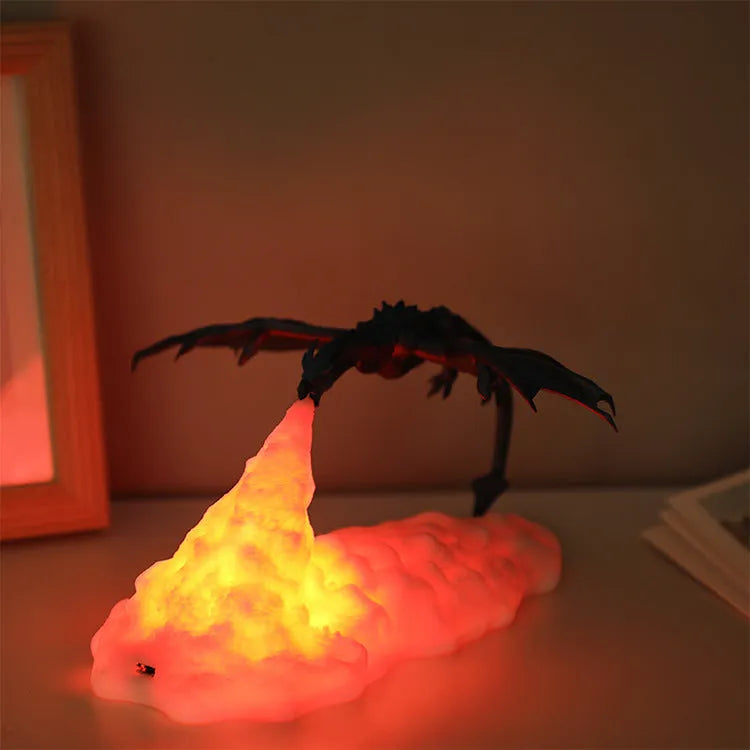 3D printed red dragon night light glowing on a table, showing detailed scales and wings, with a USB cable.