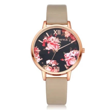 Rose gold women's watch with leather strap and love heart design