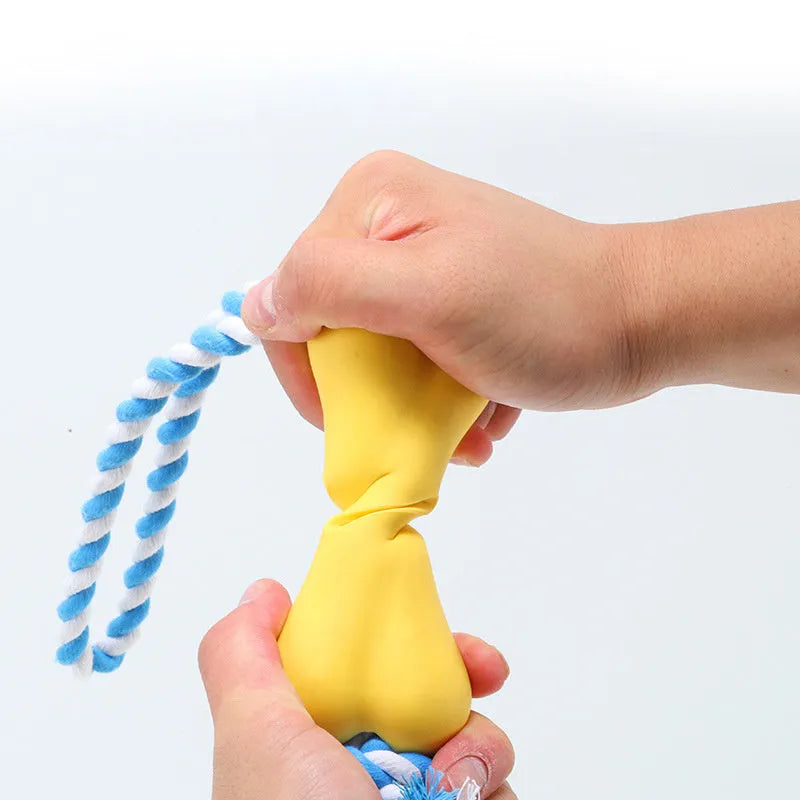 Green knotted rope bone dog toy with porous texture for holding beef strips and cheese treats
