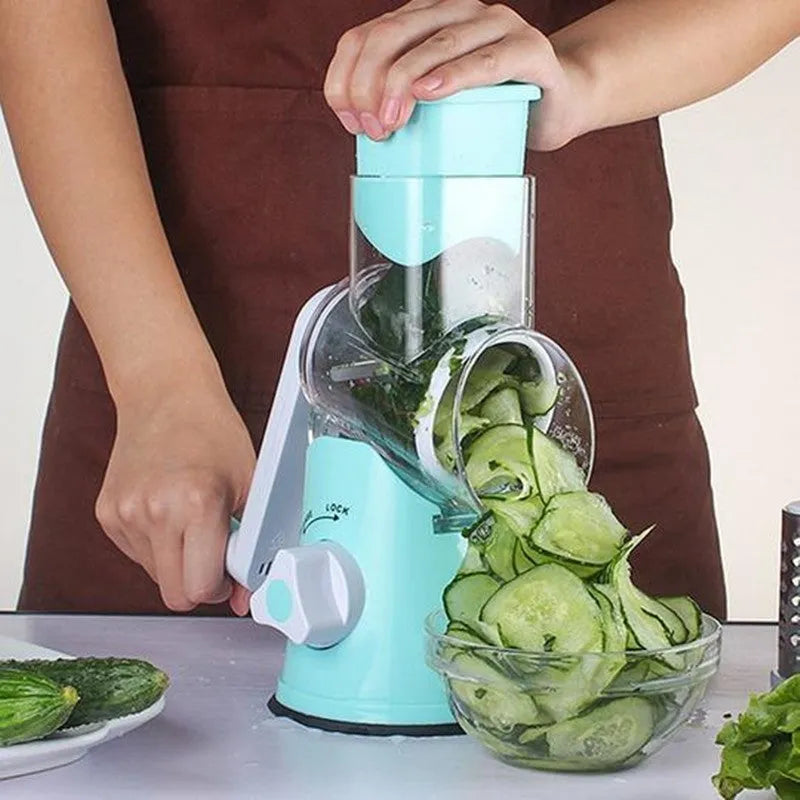 Spiralizer 3-blade vegetable slicer with transparent barrel and red plastic body on white background