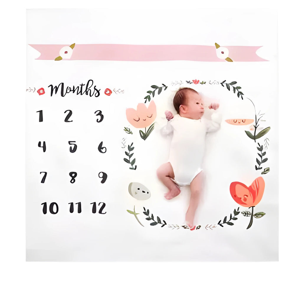White square baby blanket with folded edge on a neutral background, showing its 100x100 cm size.