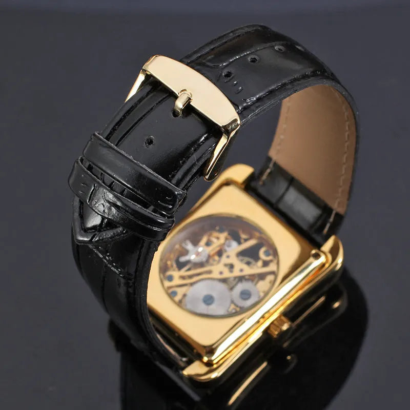 Winner men's Swiss hollow manual mechanical watch with rectangular alloy case and leather strap on white background
