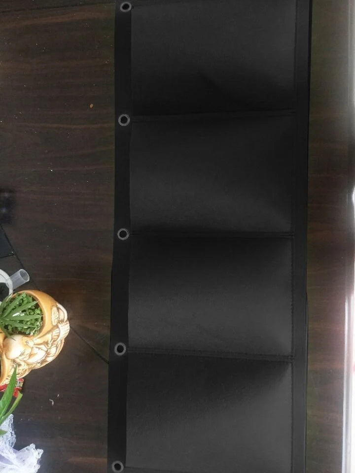 Wall mount hanging planting bags for vertical gardening in green and black