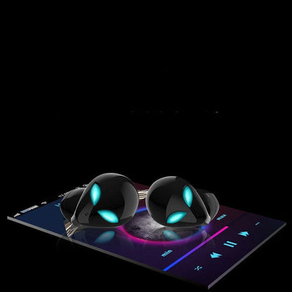 Creative Outer T8 Starman Bluetooth Headset in white and black colors with wireless charging case