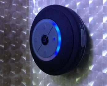 Mini Waterproof LED Speaker with Bluetooth connectivity and hands-free calling feature