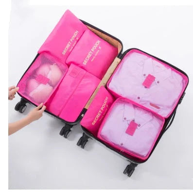 Durable waterproof packing cubes in various colors for organized, efficient travel