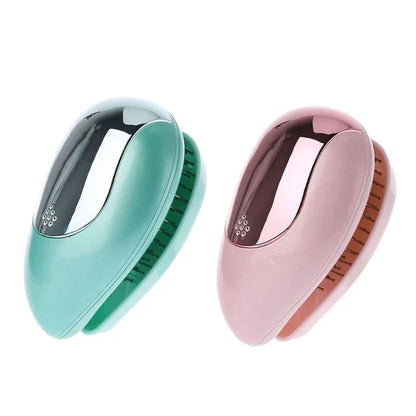 Portable negative ion hair comb with sound wave vibration technology in pink and green