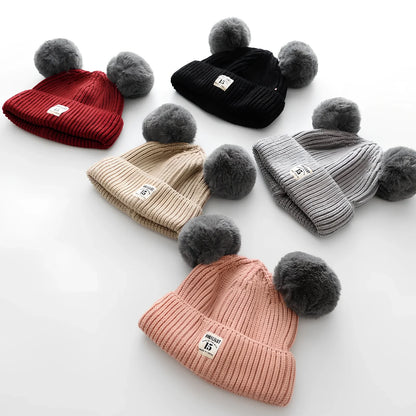 Crocheted baby wool cap in beige with soft 5 cm plush ball, high top style for 6 months-3 years winter warmth, flanged edge for secure fit