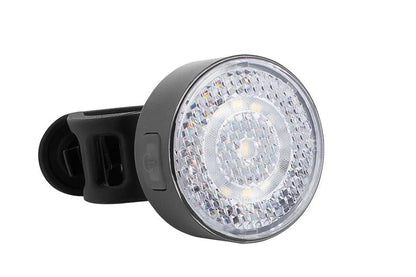Bicycle LED headlight with clip attachment showing lens reflectors and USB port for charging