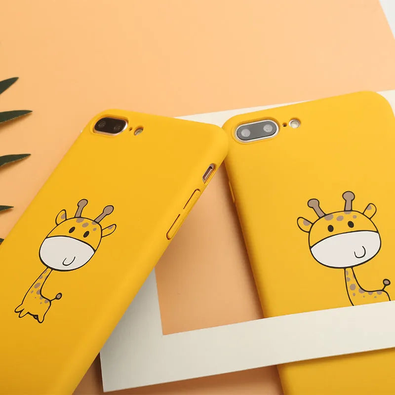 Yellow patterned hard plastic phone case for Apple iPhone models on a flat surface.