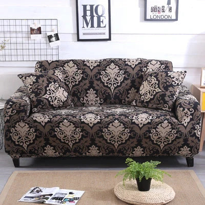 Printed stretchable sofa slipcover covering a three-seater sofa in a modern geometric pattern