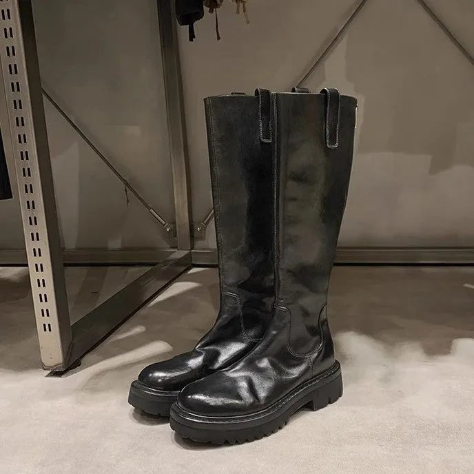 Black round toe chunky heel women's knight boots with a back zip on a white background