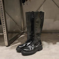 Black round toe chunky heel women's knight boots with a back zip on a white background