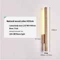 Minimalist strip wall lamp with warm light, cave stone base, black wood colour finish, 55cm length
