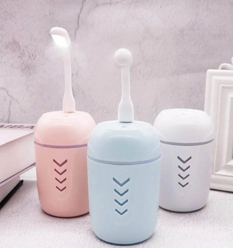 X3 portable car humidifier with column design in blue, pink and white colour options