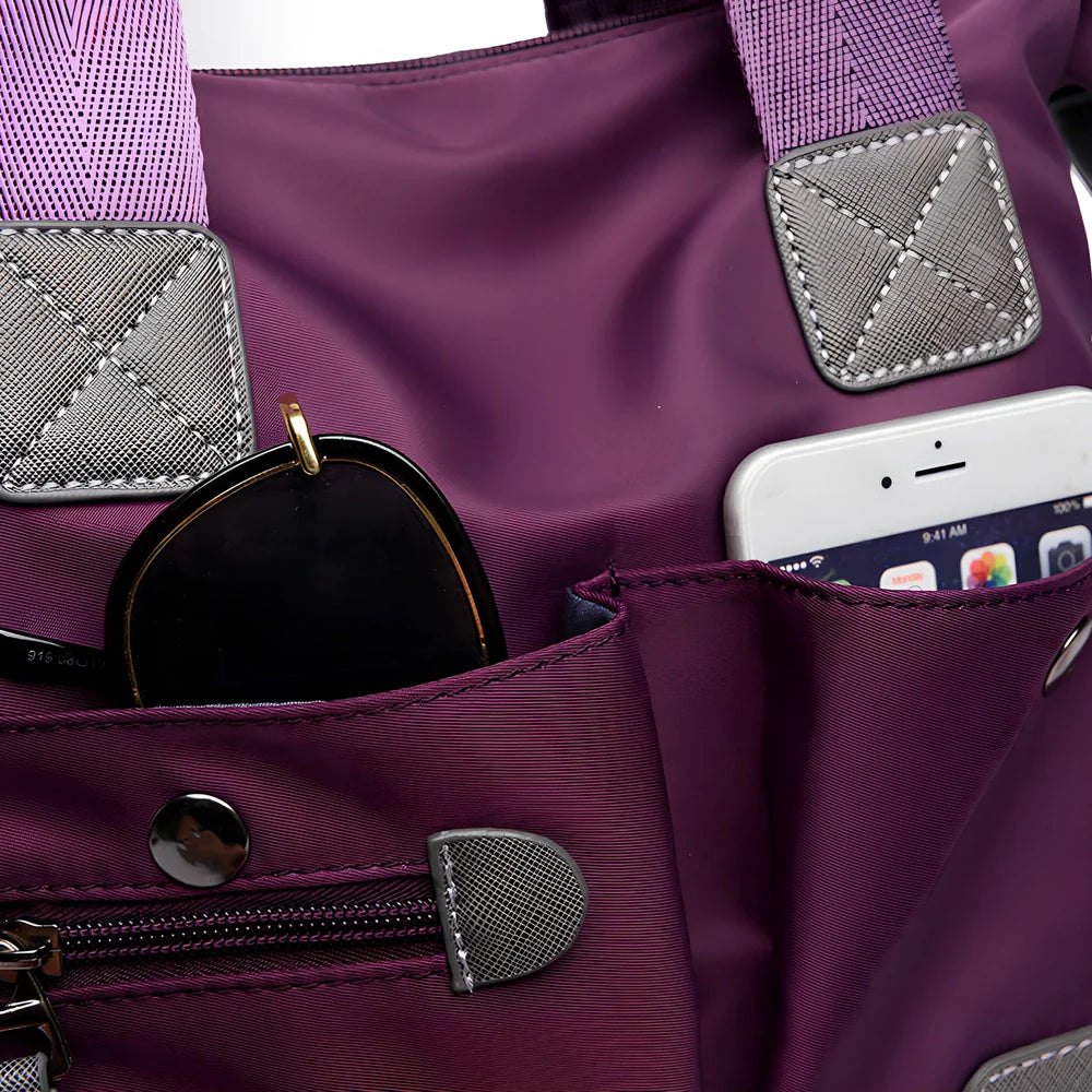 Ladies shoulder bag in black Oxford fabric, size M with multiple pockets and adjustable straps for handbag or crossbody carry, 340 mm width