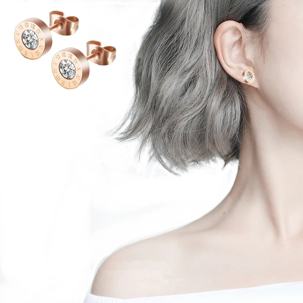 Roman Numerals and Diamond Stud Earrings in titanium steel with gold-plated finishes