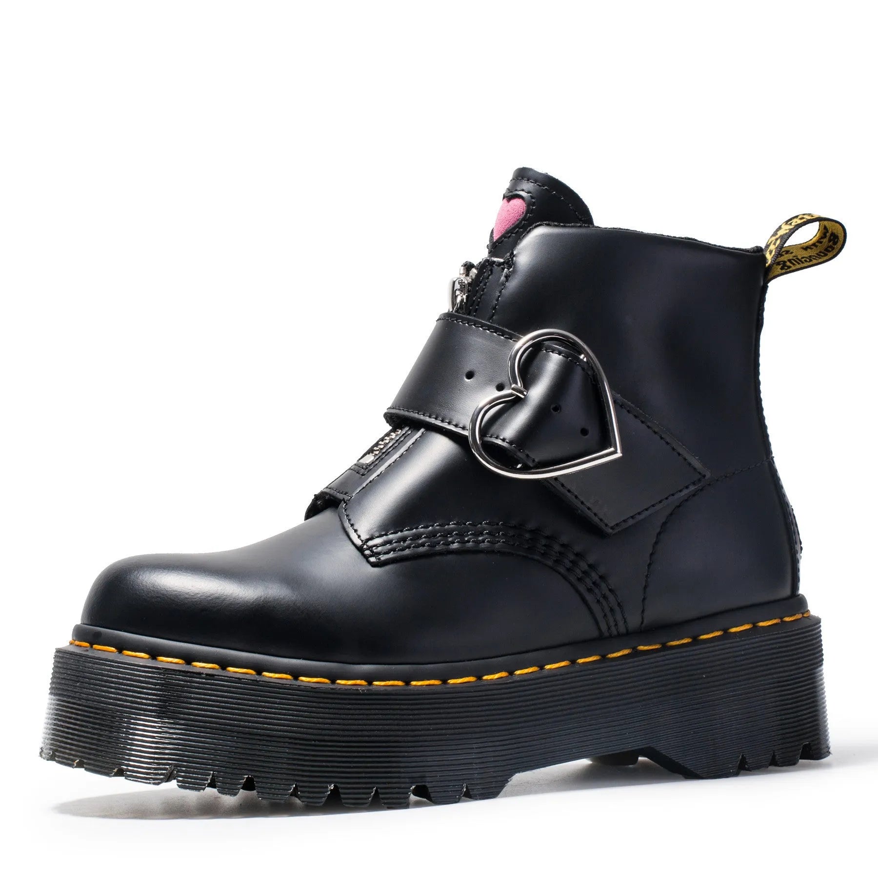 Women's black leather ankle boots with chunky heel, lace-up front, side zip, and belt buckle detail on a waterproof platform