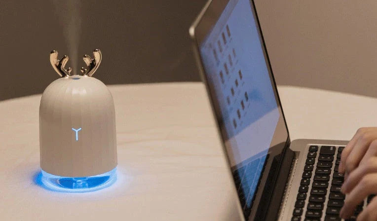 Mini humidifier in deer shape with USB charging, perfect for small spaces