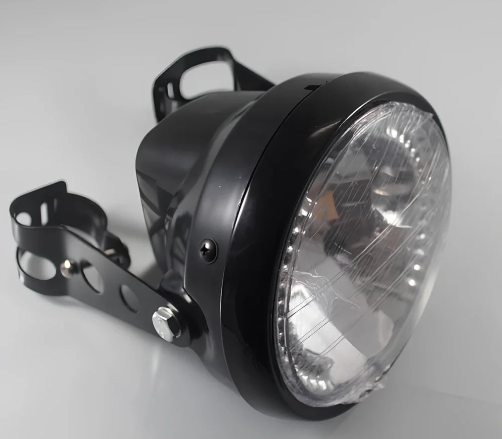 7-inch black ABS motorcycle headlight with yellow LED turn signals and adjustable brackets for cafe racer fit