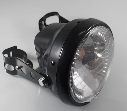 7-inch black ABS motorcycle headlight with yellow LED turn signals and adjustable brackets for cafe racer fit