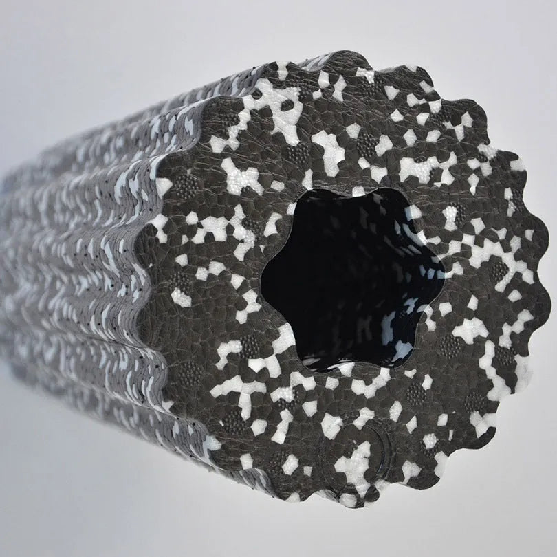 MILY SPORT 32x14 cm high density EPP foam roller in black with quincuncial surface on floor