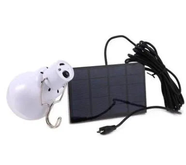 Solar panel LED bulb with warm white light for outdoor garden pathway use, compact size