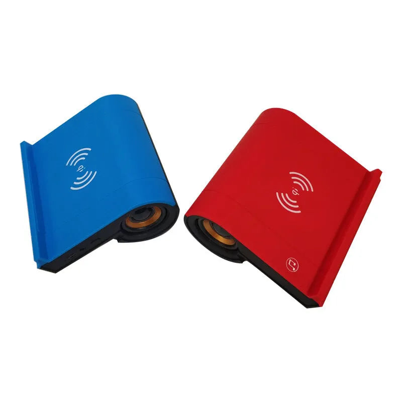 New creative wireless Bluetooth speaker in black with shaking sound and wireless charging function