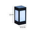 Solar-powered waterproof garden light installed on a lawn post providing white LED illumination.