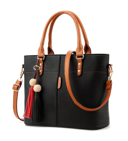 Women's black PU slung shoulder bag, 25cm height, adjustable strap for diagonal carry with phone and wallet inside