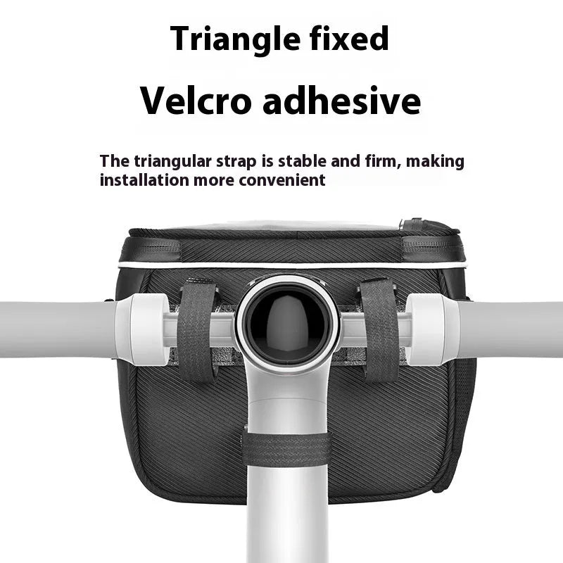 Black 7-inch polyester bicycle handlebar bag mounted on bike, showing compact folding design.