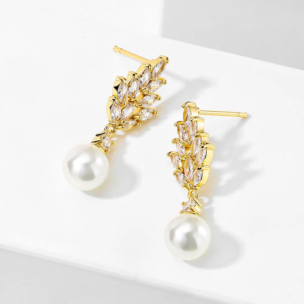 Geometric flower earrings with micro inlaid zircon stones and pearl elements in three plating colours