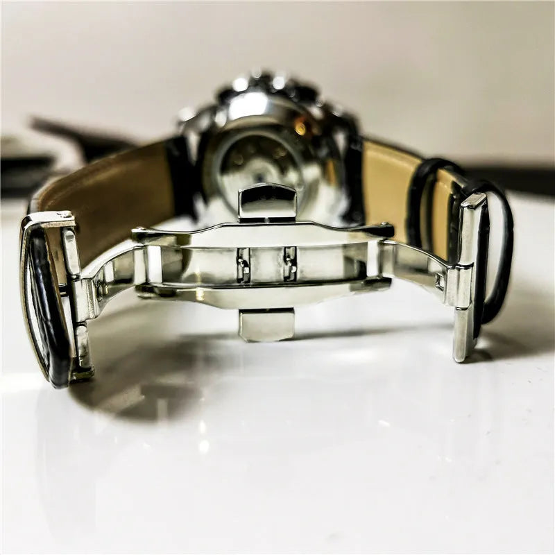 Men's automatic mechanical watch with stainless steel case and choice of black or white dial.