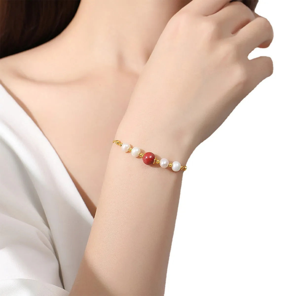 Yellow retro-style cinnabar bracelet for women made from 925 silver on a neutral background.