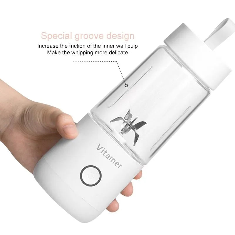 White portable USB rechargeable blender bottle with silicone handle and stainless steel blade.