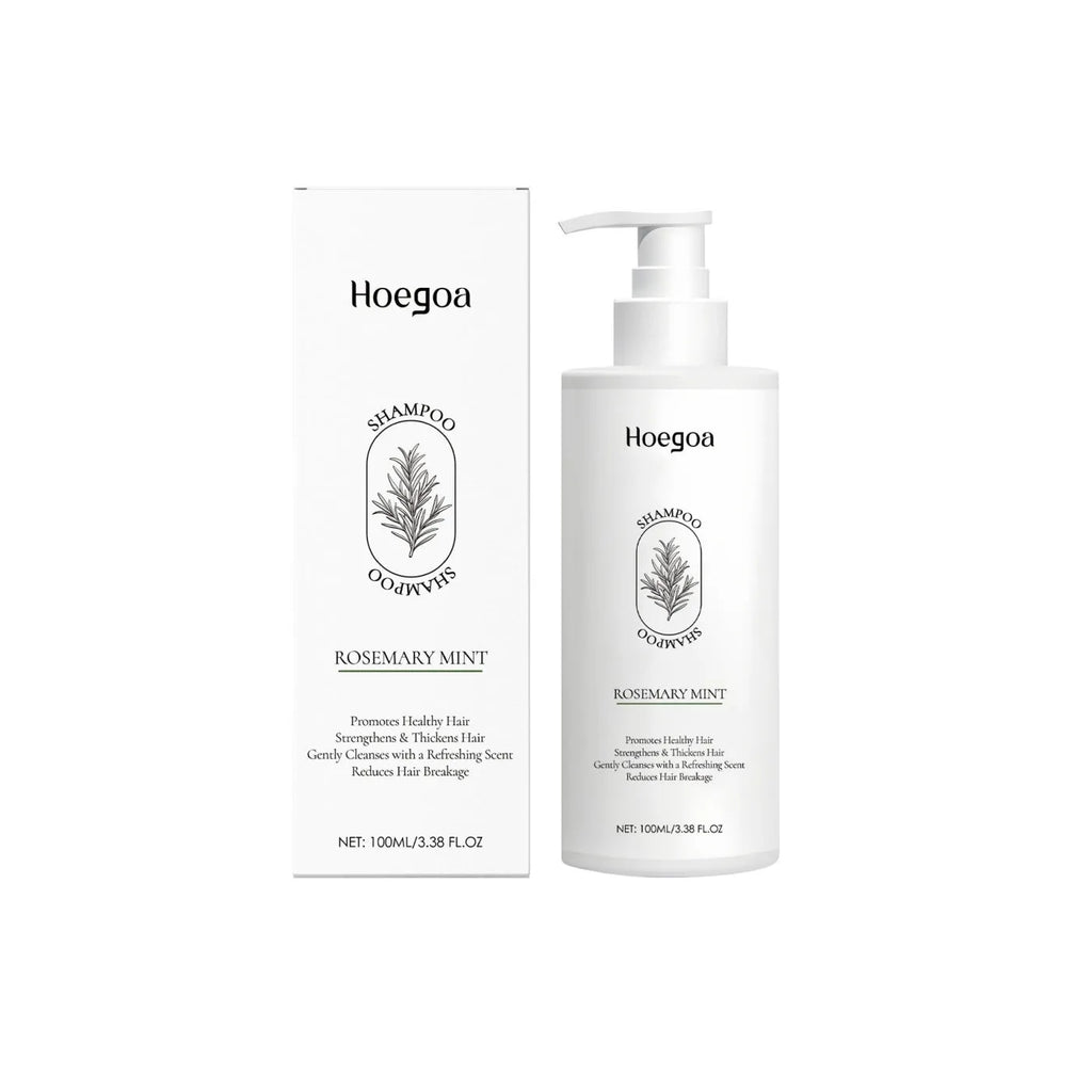 Rosemary mint shampoo 100ml bottle with green leaves and mint on white background