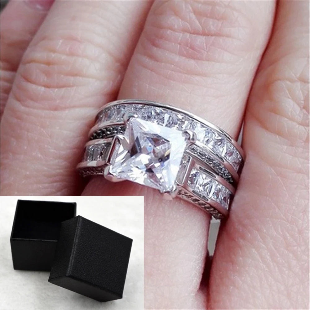 Silver charm couple rings with princess cut CZ, perfect for anniversaries, promises, or engagements
