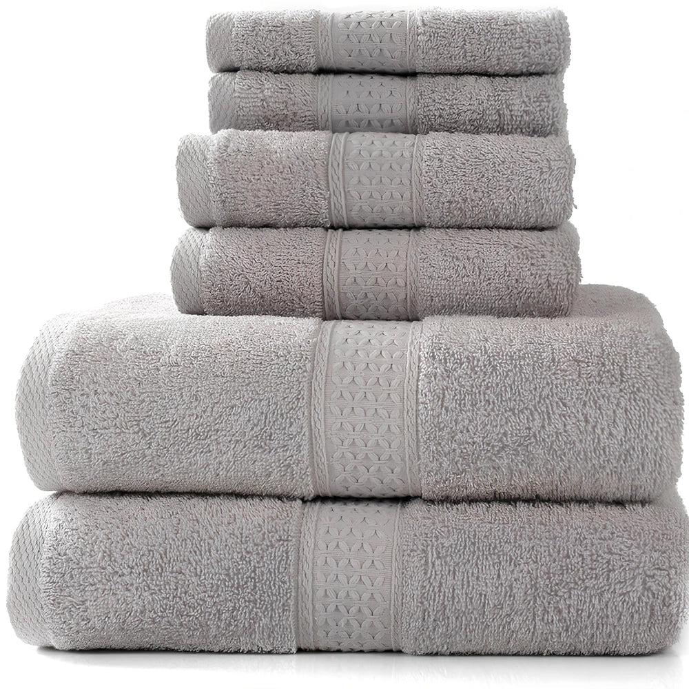 Pure cotton absorbent towel set in bamboo green, showing 140x70cm bath, 33x73cm hand, and 33x33cm square towels