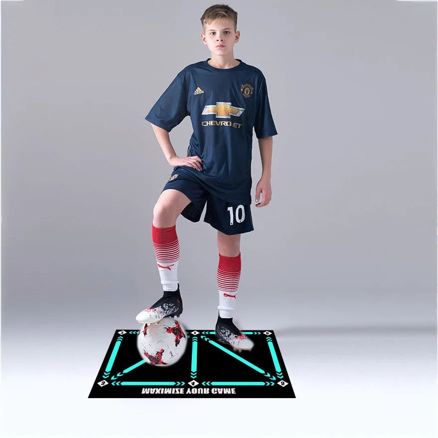 Black rectangular football training mat with non-slip base measuring 60 by 90 centimetres