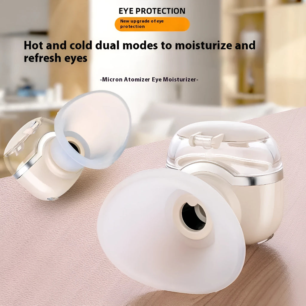 Milky white rechargeable eye moisturising instrument with hot and cold double compress on a desk