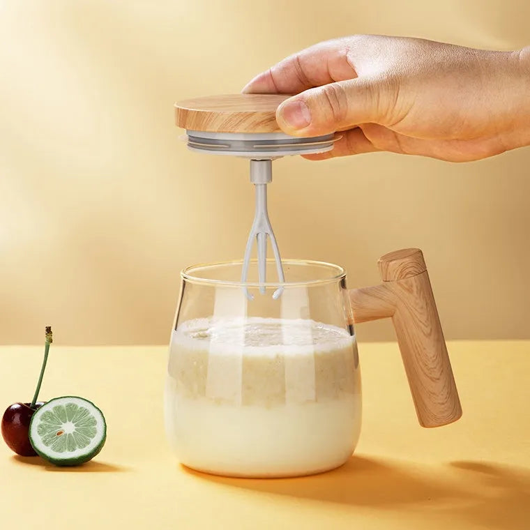 400ml automatic self-stirring coffee mug in borosilicate glass with electric mixing button.