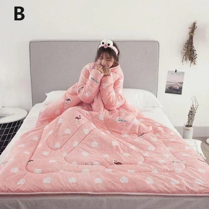 Cozy fleece-lined blanket with sleeves in various colors and designs, providing warmth and comfort for cold weather use.