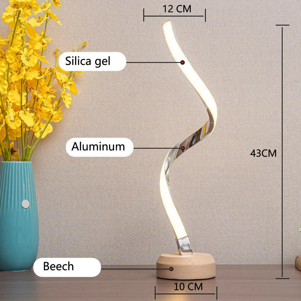 Modern wood LED spiral table lamp with touch dimmer and USB power on a bedside table