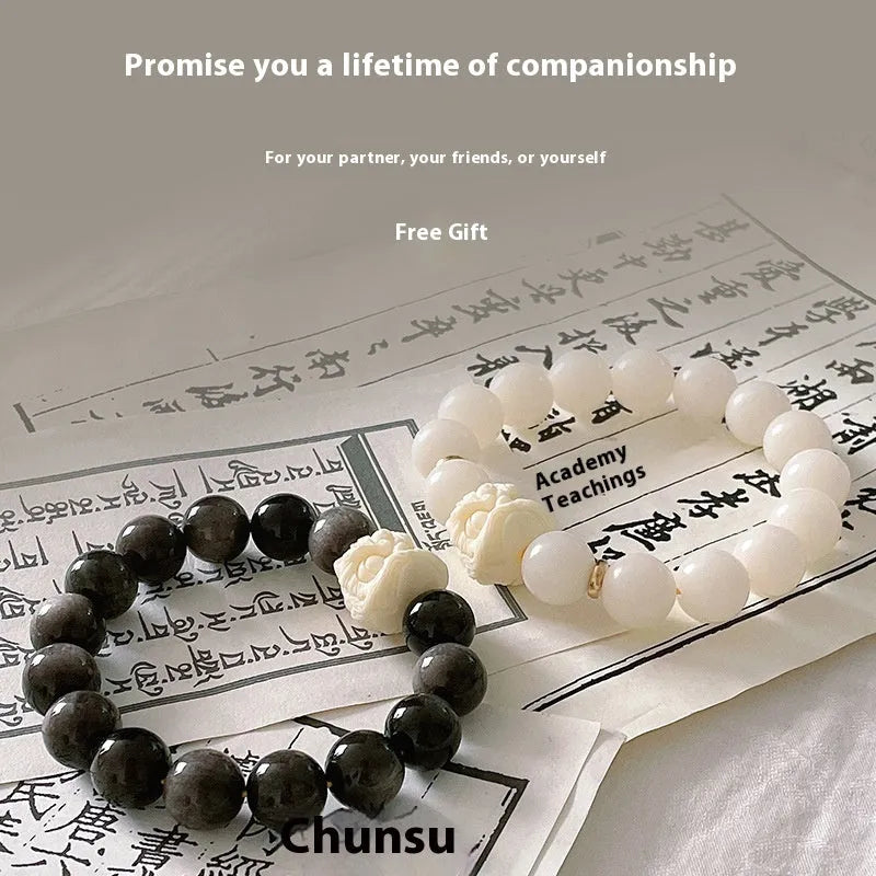 Obsidian prayer beads bracelet with manual processing and chamfered square grain details