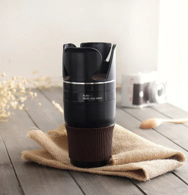 Rotatable ABS car cup holder in green, black, and pink for convenient drink storage