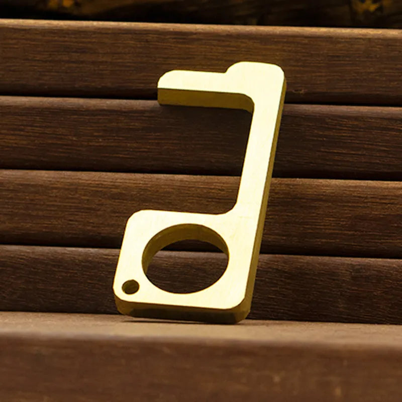 Antibacterial EDC door opener on a key ring, aluminium and copper styles for public touchpoints