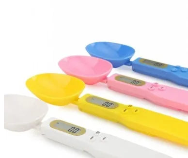 Digital spoon kitchen scale with LCD display showing weight measurement in grams