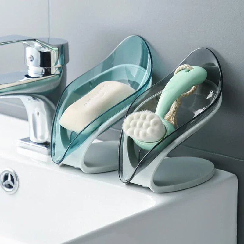 Self-draining leaf-shaped soap dish made of durable ABS material, featuring a unique triangle structure to prevent soap from slipping