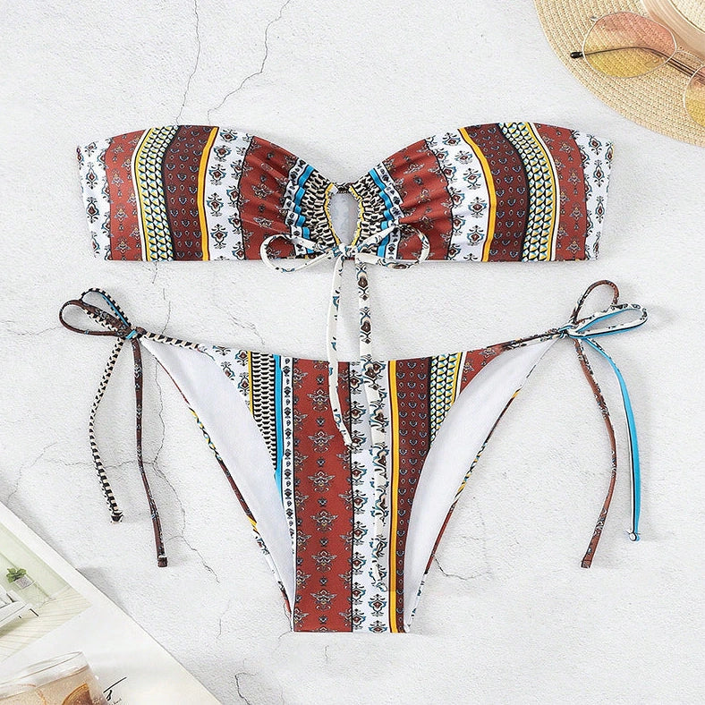 Women's mixed colour swimsuit with front lace-up ties and split leg design
